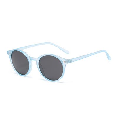Round black full-rim sunglasses with vibrant blue polarized lenses, ideal for sun protection and fashion. - Image 14
