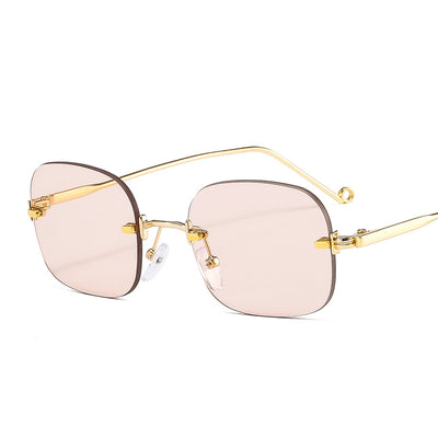 Frameless square sunglasses featuring vibrant blue lenses and sleek gold-colored metal temples and bridge. - Image 9