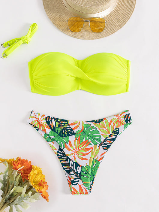 Blue bandeau bikini top with tropical leaf print high-cut bottom, styled with sandals, sunglasses, and a straw hat. - Image 9