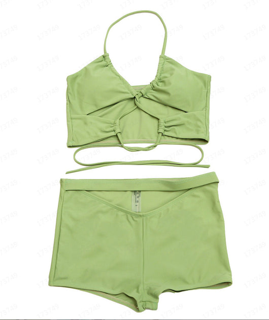 Solid neon orange string bikini with a halter top featuring a keyhole cutout and tie-side bottoms. - Image 32