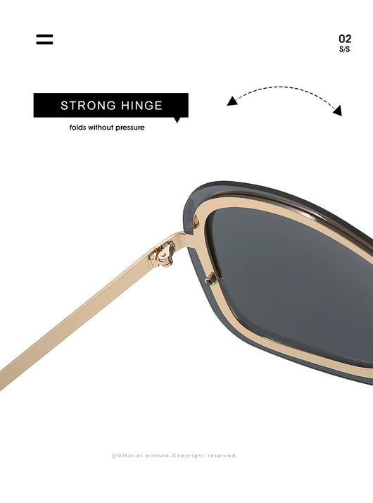 Women's fashionable shield sunglasses with a gold metal frame and dark gray lenses, featuring a unique wavy design. - Image 18