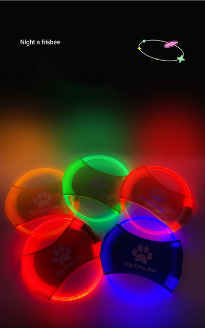 Red LED light-up dog flying disc with a white paw print logo and "dog flying disc" text. - Image 18