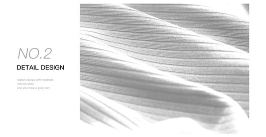 White ribbed high-waisted skort with a pleated skirt overlay, ruched side with drawstrings, and a ruffled hem. - Image 22