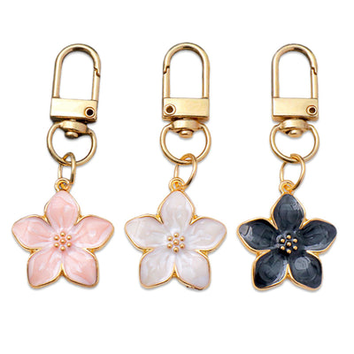 Dije Flor de Cerezo Iridiscente con Aceite Flotante - Accesorio Multiuso - Image 12