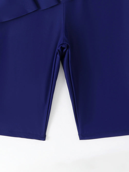 Navy blue two-piece conservative swimwear with short-sleeve peplum top and mid-length shorts, featuring a front zipper. - Image 13