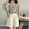 Blusa Protectora Floral con Mangas Linterna y Filtro Solar