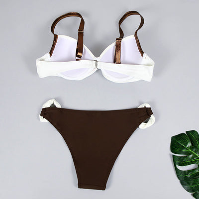 Women's two-piece swimsuit with a pink pleated bandeau top and brown bikini bottoms with pink accents, by the ocean. - Image 22