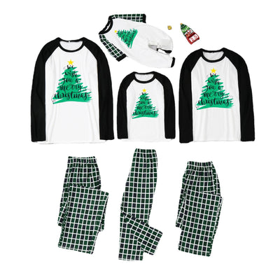 Matching family Christmas pajamas with white and black raglan tops featuring a green Christmas tree graphic and plaid pants. - Image 2