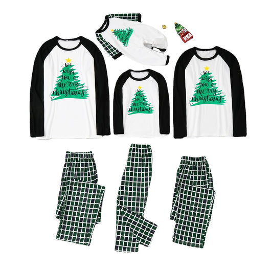 Matching family Christmas pajamas with white and black raglan tops featuring a green Christmas tree graphic and plaid pants. - Image 2