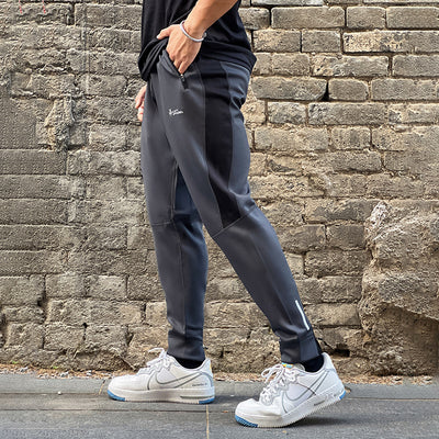 Pantalones de Chándal con Bolsillos de Cierre y Tela Elástica - Image 4