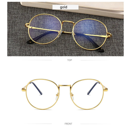 Black round anti-blue light glasses with clear lenses showing a blue reflection, resting on a gray textured surface. - Image 12