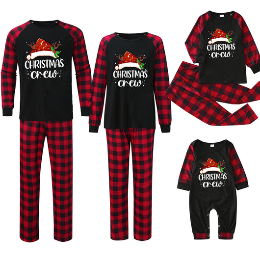 Kids' Christmas pajama set with a black "Christmas Crew" top and red and black buffalo plaid pants. - Image 7