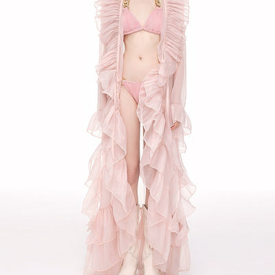 Light pink ruffled sheer swimsuit cover-up blouse over a matching bikini, perfect for beach vacations. - Image 4
