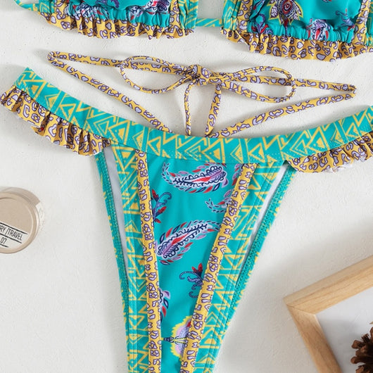Teal bohemian print bikini with halter neck top, ruffled edges, and high-cut bottom with side straps. - Image 8