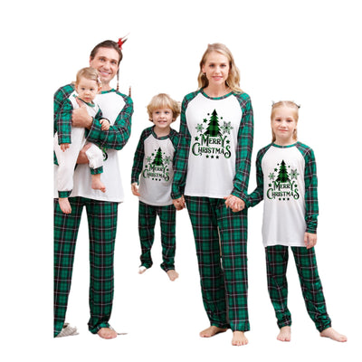Family of four wearing matching green plaid Christmas pajamas with "Merry Christmas" and Christmas tree print. - Image 5