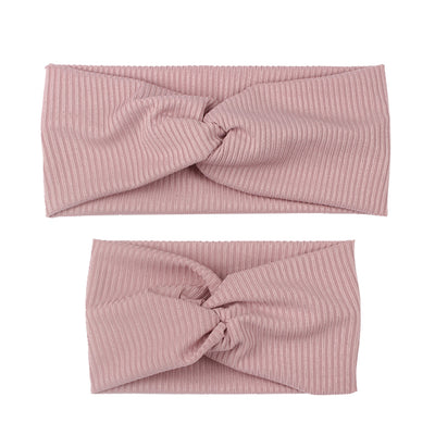 Matching dusty rose ribbed knit headbands with a twisted knot, one for an adult and one for a child. - Image 9