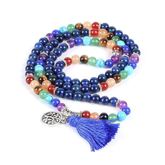 Blue mala prayer beads with chakra colored gemstones, a silver Tree of Life charm, and a blue tassel. - Image 7
