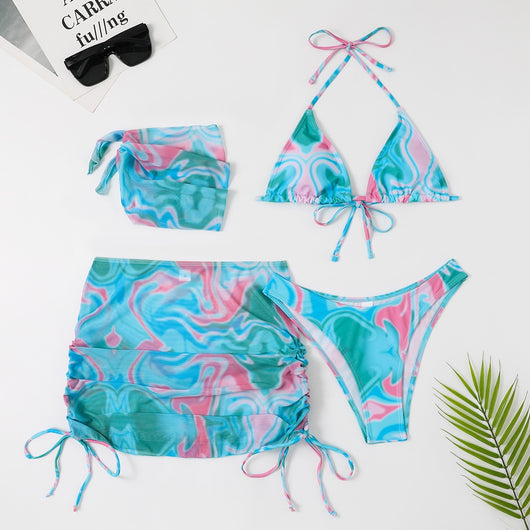 Four-piece tie-dyed bikini swimsuit set in orange, yellow, and white, with a triangle top, high-cut bottoms, ruched mini skirt, and matching headscarf. - Image 43