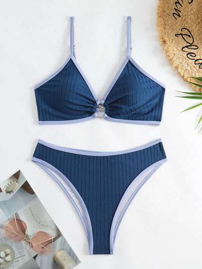 Women's dark blue ribbed two-piece swimsuit with light blue trim, triangle top, and high-cut bikini bottom. - Image 21