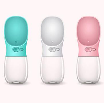 White portable pet water bottle with a clear reservoir and built-in drinking bowl, shown in a bag. - Image 21