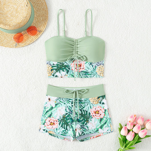 Women's light green two-piece bikini swimsuit with tropical floral and pineapple print, featuring drawstring top and shorts. - Image 4