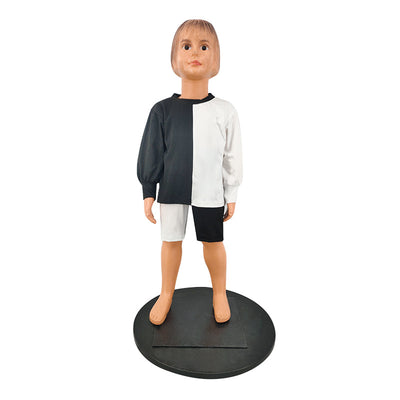Woman wearing a black and white color-block long-sleeve top and matching shorts with white sneakers. - Image 16