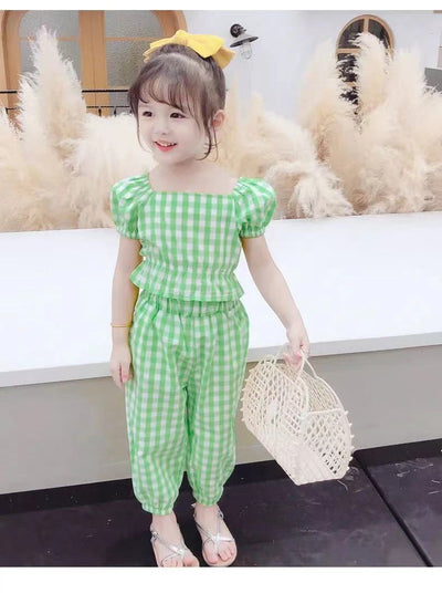 Conjunto Infantil de Dos Piezas con Blusa de Mangas Abullonadas y Estampado Floral