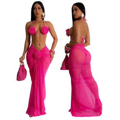Blue three-piece bikini set with floral appliques on the triangle top, thong bottom, and matching ruched maxi skirt. - Image 5