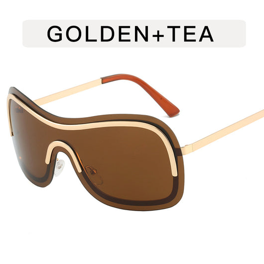 Women's fashionable shield sunglasses with a gold metal frame and dark gray lenses, featuring a unique wavy design. - Image 9