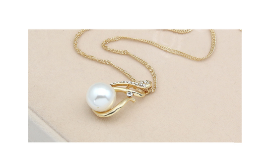 Gold-tone necklace and matching earrings set with white faux pearls and clear rhinestones, ideal for bridal or dinner wear. - Image 10