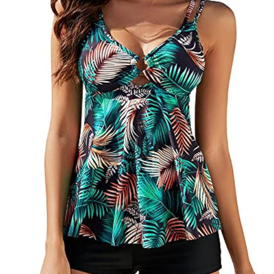 Women's plus size two-piece swimsuit with a red floral print tankini top and black boxer swim shorts.