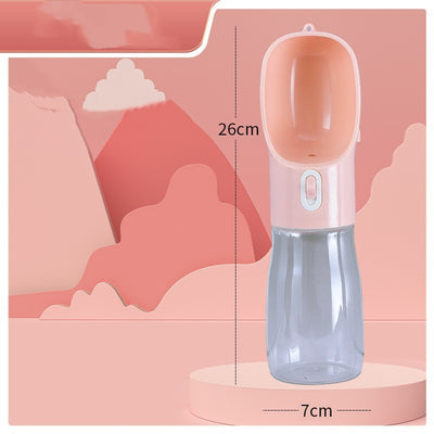 Pink portable pet water bottle with integrated feeder bowl, clear reservoir, and dispensing button for dogs. - Image 15