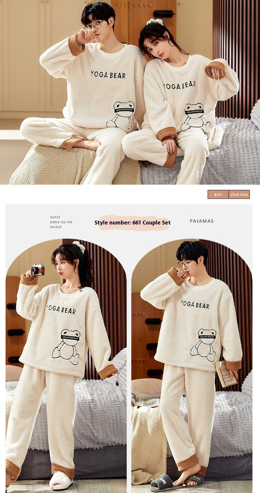 Couple wearing matching cream coral fleece pajamas with gray pants and bear embroidery, seated on a bed. - Image 27