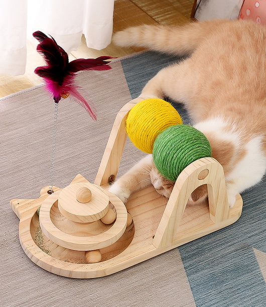 Solid wood cat toy with a tiered ball track, a spring-loaded feather wand, and green and yellow sisal rollers. - Image 5