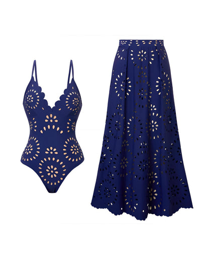 Navy blue women's one-piece swimsuit and matching midi skirt set with laser-cut floral patterns and scalloped edges. - Image 6