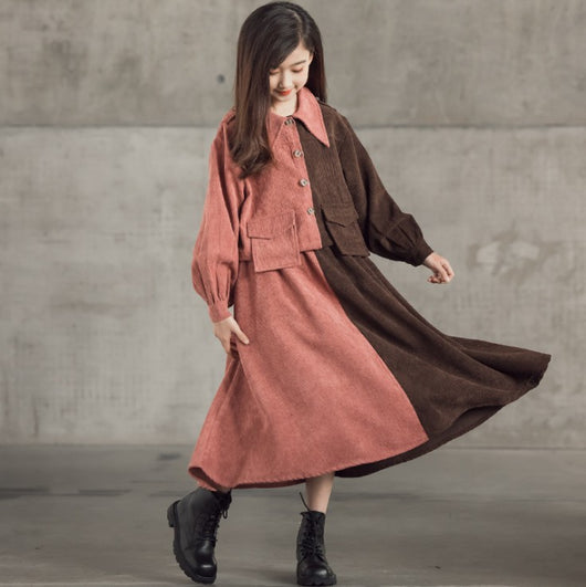 Young girl in a pink and brown color-block corduroy two-piece dress set with a collared top and midi skirt. - Image 3