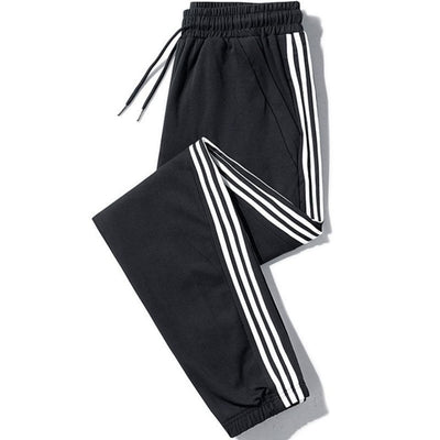 Pantalones Harlan de Tres Rayas para Hombre - Estilo Casual Moderno - Image 4