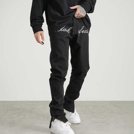 Jeans Retro con Bordados Trendy y Cortes Laterales