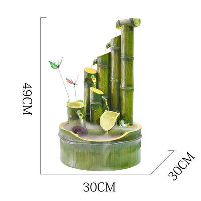 Green bamboo-themed indoor water fountain with multiple tiers, a water wheel, and small frog and butterfly accents. - Image 2