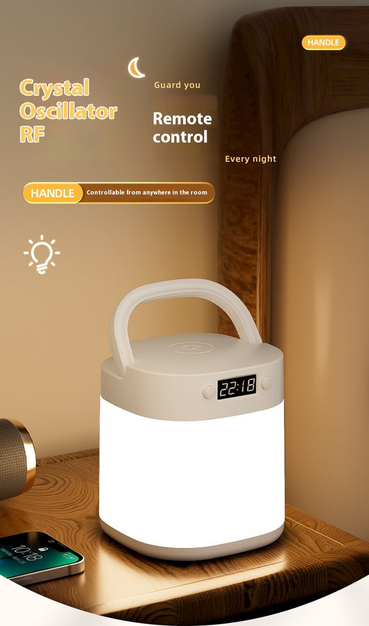 White rechargeable LED table lamp with a digital clock display and a light gray carrying handle. - Image 21