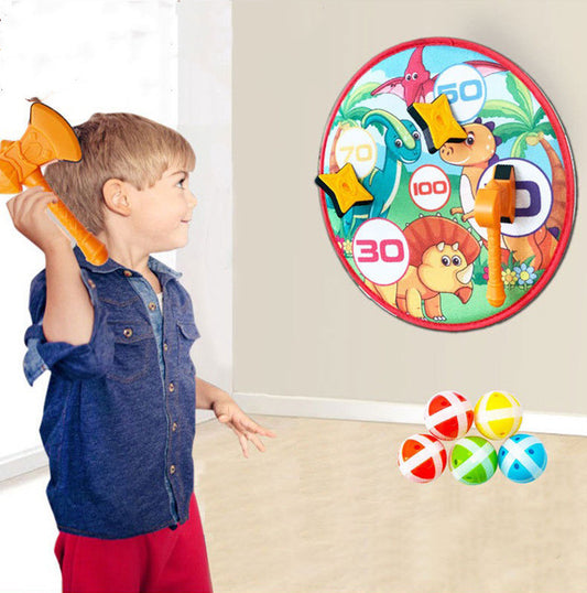Three orange and black star-shaped sticky balls for a dart game, shown against a plain white background.