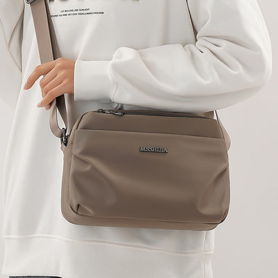 Bolsa Crossbody Casual Versátil con Múltiples Compartimentos - Image 3