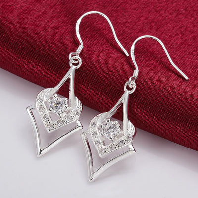 Aretes Geométricos de Plata con Zirconia Cúbica en Forma de Corazón y Estrella - Image 9