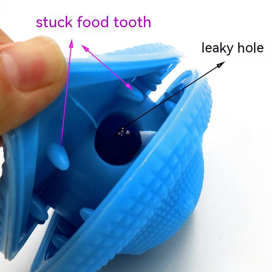 Blue TPR pet toy ball with textured surface, designed for food dispensing and molar training, with kibble scattered around. - Image 2