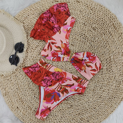 Women's one-shoulder ruffled bikini with a vibrant red and pink floral print, high-waisted bottoms. - Image 3