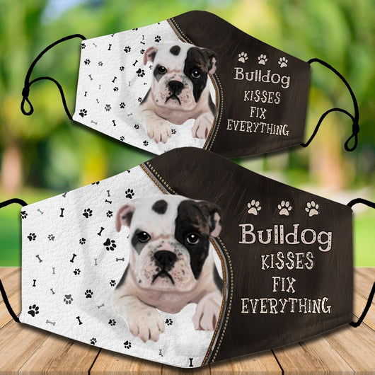 Two cotton face masks with a Bichon Frise dog, paw prints, and bones on a white and brown background. Text reads "Bichon Frise KISSES FIX EVERYTHING." - Image 21