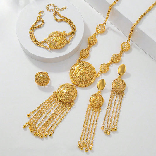 Gold butterfly jewelry set with filigree design, including a necklace, tassel earrings, bracelet, and ring. - Image 2