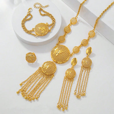 Gold butterfly jewelry set with filigree design, including a necklace, tassel earrings, bracelet, and ring. - Image 2