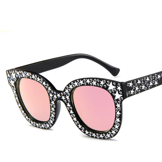 Black cat-eye sunglasses for ladies, featuring silver star embellishments on the frames and temples. - Image 7