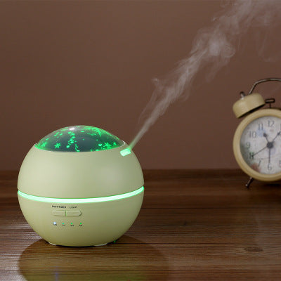 Mini wood grain aroma diffuser and humidifier with a starry night light projector, emitting mist and glowing purple. - Image 5